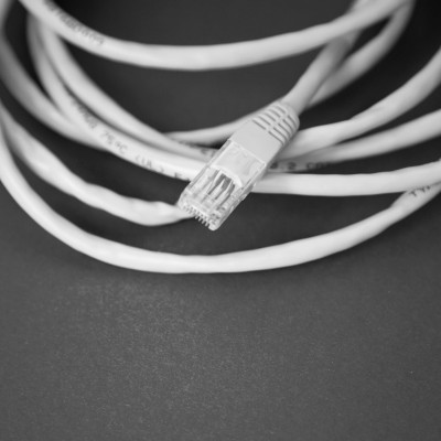 Coiled, yellow data cable